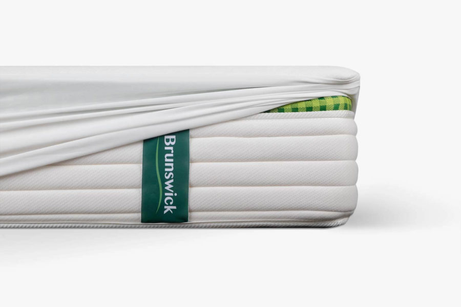 Mattress protector stretching over king size Brunswick.