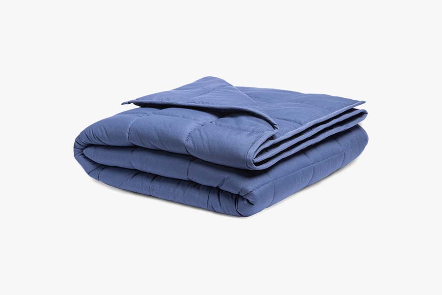 Classic Weighted Blanket folded neatly, with one corner pulled back